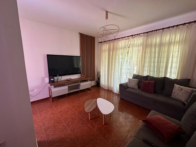 Quarto 1 - Refugio Verde Aconchegante com Ar-Cond.