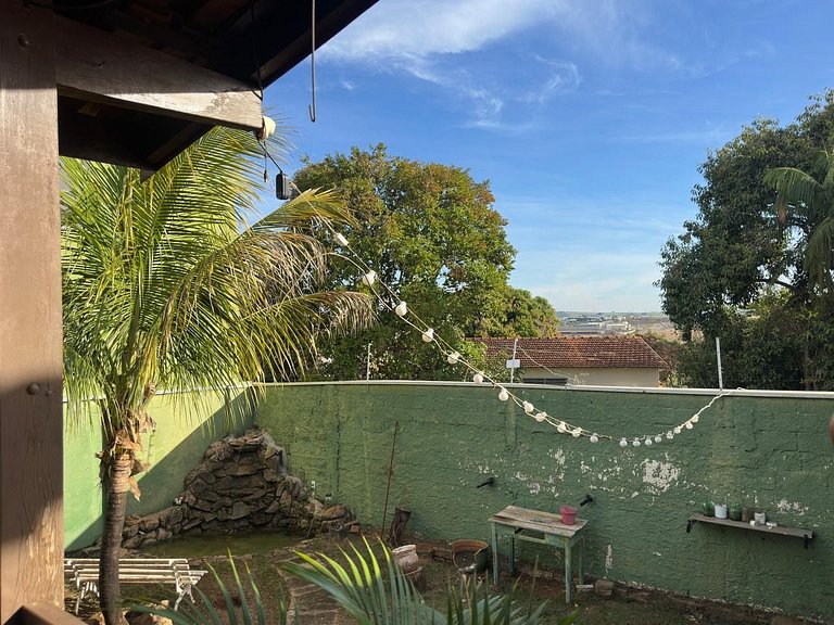 Quarto 1 - Refugio Verde Aconchegante com Ar-Cond.